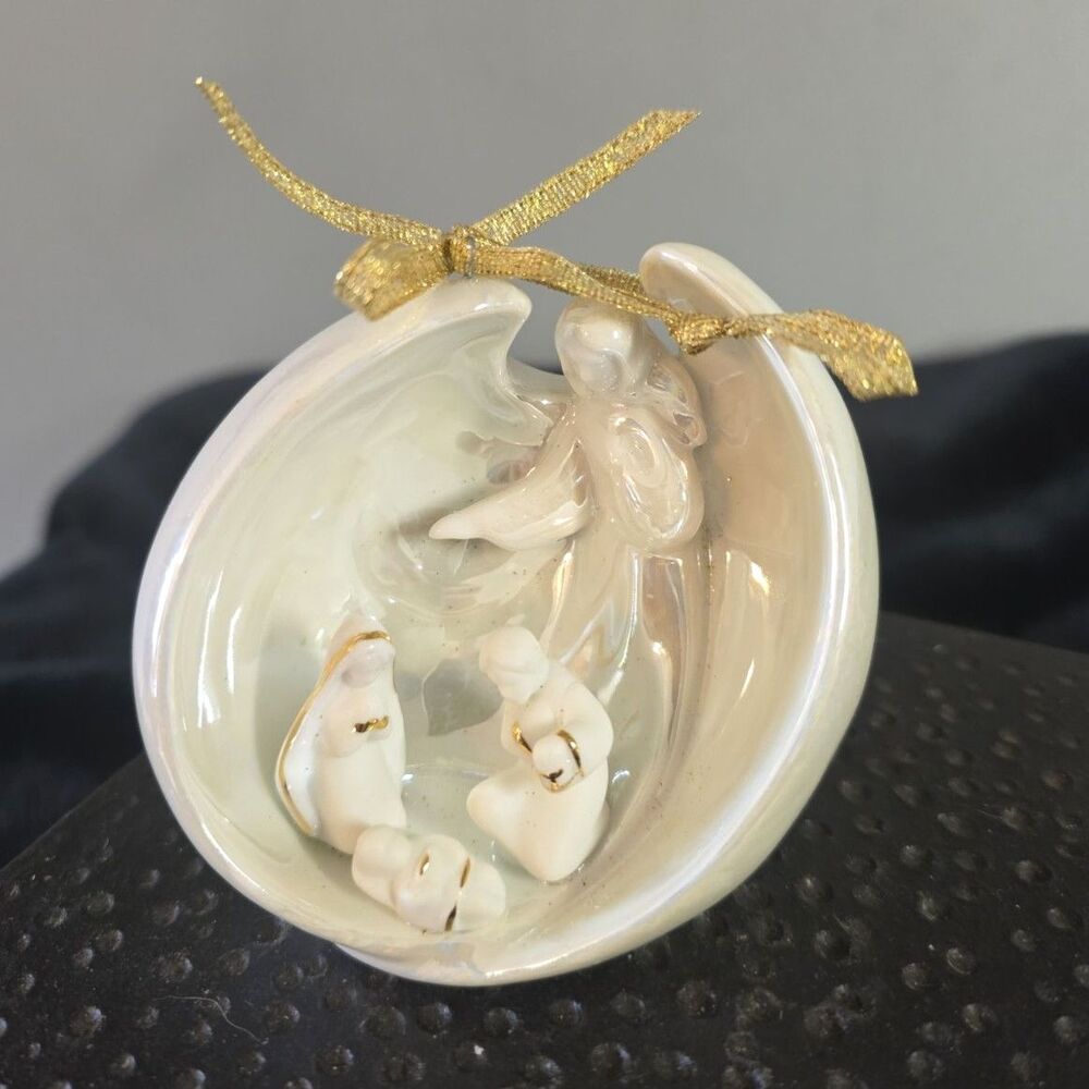 AppleTree Designs Angel Holding the Holy Family Ornament